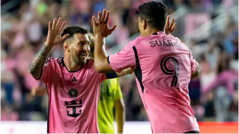 Inter Miami forward Lionel Messi celebrates with Luis Suarez
