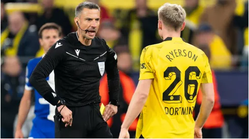 Slavko Vincic interacts with Julian Ryerson of Borussia Dortmund
