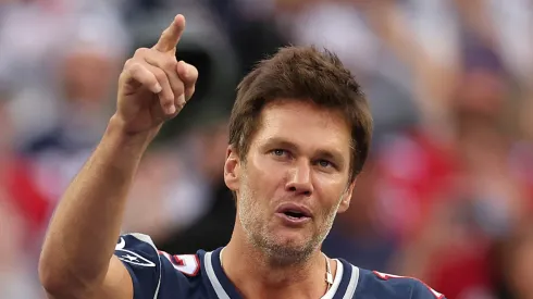 Former New England Patriots quarterback Tom Brady speaks during a ceremony honoring him at halftime of New England's game against the Philadelphia Eagles at Gillette Stadium on September 10, 2023 in Foxborough, Massachusetts.
