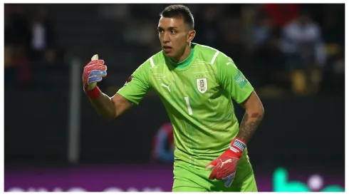 Fernando Muslera of Uruguay gestures during a match between Uruguay and Argentina
