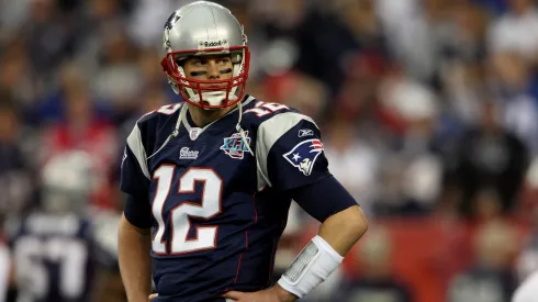 Quarterback Tom Brady #12 of the New England Patriots looks on during Super Bowl XLII against the New York Giants
