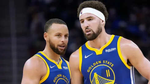 Klay Thompson #11 and Stephen Curry #30 of the Golden State Warriors talks with each other against Indiana Pacers during the first half of an NBA basketball game at Chase Center on January 20, 2022 in San Francisco, California.
