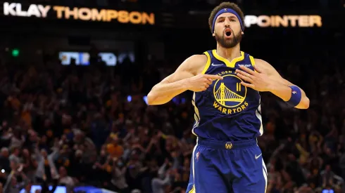 Klay Thompson #11 of the Golden State Warriors celebrates his three-point shot against the Memphis Grizzlies in the fourth quarter in Game Six of the 2022 NBA Playoffs Western Conference Semifinals.

