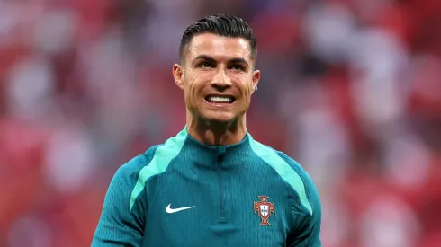 Cristiano Ronaldo of Portugal looks on as he warms up prior to the UEFA EURO 2024 group stage match between Portugal and Czechia at Football Stadium Leipzig on June 18, 2024 in Leipzig, Germany.
