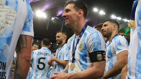 Lionel Messi of Argentina smiles with teammates after receiving the medal after winning the final of Copa America Brazil 2021 between Brazil and Argentina at Maracana Stadium on July 10, 2021 in Rio de Janeiro, Brazil. 

