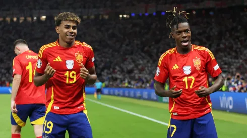 Nico Williams of Spain celebrates scoring his team's first goal with teammate Lamine Yamal during the UEFA EURO 2024 final match between Spain and England at Olympiastadion on July 14, 2024 in Berlin, Germany.

