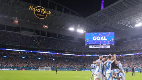 Lautaro Martinez of Argentina celebrates with teammates after scoring the team's first goal during the CONMEBOL Copa America 2024 Group A match between Argentina and Peru at Hard Rock Stadium
