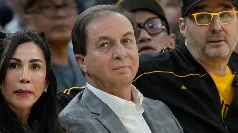 Nicole Curran, Golden State Warriors owner Joe Lacob, and poker pro Phil Hellmuth sit court side during the second quarter of the game between the San Antonio Spurs and Golden State Warriors at Chase Center on March 09, 2024 in San Francisco, California.
