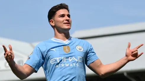 Julian Alvarez of Manchester City celebrates scoring his team's fourth goal during the Premier League match between Fulham FC and Manchester City at Craven Cottage on May 11, 2024 in London, England.

