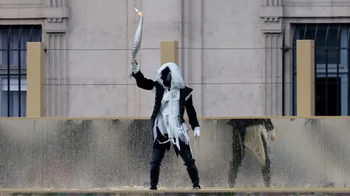 Masked man at the Paris 2024 Olympics opening ceremony
