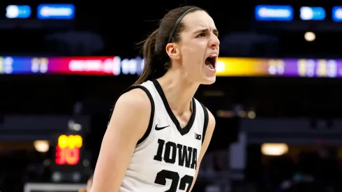 Caitlin Clark #22 of the Iowa Hawkeyes celebrates her three-point basket against the Ohio State Buckeyes in the first half of the championship game of the Big Ten Women's Basketball Tournament at Target Center on March 5, 2023 in Minneapolis, Minnesota.
