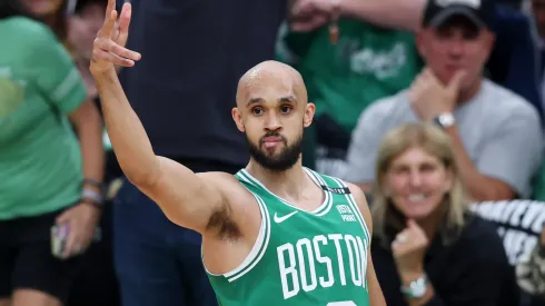 Derrick White #9 of the Boston Celtics reacts after a three point basket against the Dallas Mavericks during the first quarter of Game Five of the 2024 NBA Finals