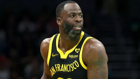 Draymond Green #23 of the Golden State Warriors looks over the court during the first half of the game against the Charlotte Hornets at Spectrum Center on March 29, 2024 in Charlotte, North Carolina. 

