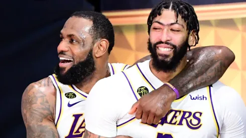 LeBron James #23 of the Los Angeles Lakers and Anthony Davis #3 of the Los Angeles Lakers react after winning the 2020 NBA Championship in Game Six of the 2020 NBA Finals at AdventHealth Arena at the ESPN Wide World Of Sports Complex on October 11, 2020 in Lake Buena Vista, Florida.
