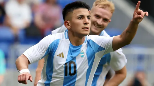 Thiago Almada #10 of Team Argentina celebrates scoring his team's first goal during the Men's group B match between Ukraine and Argentina during the Olympic Games Paris 2024 at Stade de Lyon on July 30, 2024 in Lyon, France.