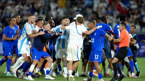 Nicolas Otamendi #16 of Team Argentina and Enzo Millot #12 of Team France clash after the Men's Quarterfinal match between France and Argentina during the Olympic Games Paris 2024.
