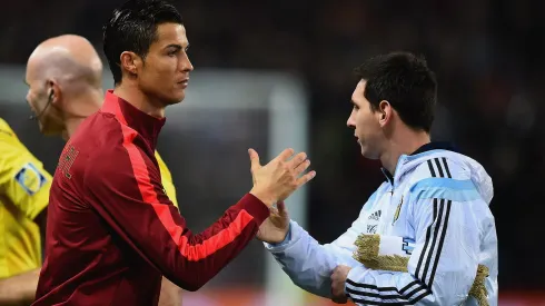 Cristiano Ronaldo of Portugal shakes hands with Lionel Messi of Argentina prior to the International Friendly between Argentina and Portugal at Old Trafford on November 18, 2014 in Manchester, England.
