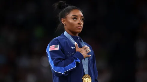 Gold medalist Simone Biles of Team United States on the podium during the medal ceremony for the Artistic Gymnastics Women's Vault Final.
