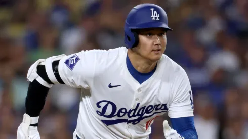 Shohei Ohtani #17 of the Los Angeles Dodgers hits a double during the fifth inning against the Philadelphia Phillies at Dodger Stadium on August 05, 2024 in Los Angeles, California.