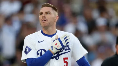 Freddie Freeman #5 of the Los Angeles Dodgers acknowledges applause from fans at the plate as he returns to the lineup after missing games to be with his son and family who was hospitalized during the first inning at Dodger Stadium on August 05, 2024 in Los Angeles, California. 
