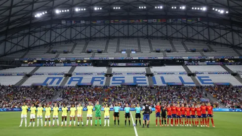 Players of Team Brazil and Team Spain stand for the national anthems prior to the Women's semifinal match between Brazil and Spain during the Olympic Games Paris 2024