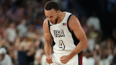 Stephen Curry #4 of Team United States reacts after a basket during a Men's basketball semifinals match between Team United States and Team Serbia on day thirteen of the Olympic Games Paris 2024 at Bercy Arena on August 08, 2024 in Paris, France.
