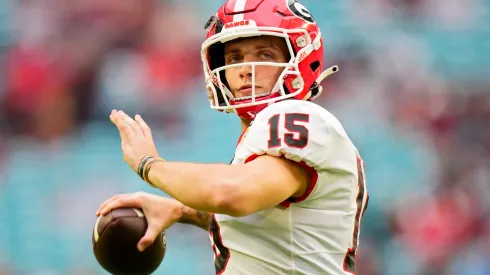 Carson Beck #15 of the Georgia Bulldogs warms up before the Capital One Orange Bowl against the Florida State Seminoles at Hard Rock Stadium on December 30, 2023 in Miami Gardens, Florida.
