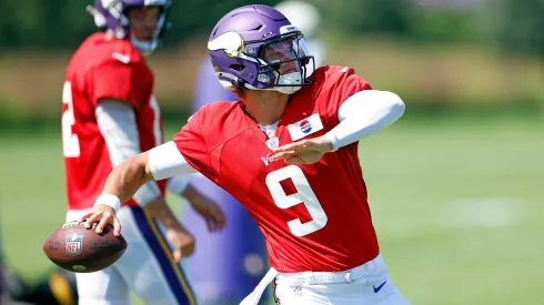 J.J. McCarthy #9 of the Minnesota Vikings participates in a drill during training camp on August 02, 2024 in Eagan, Minnesota.
