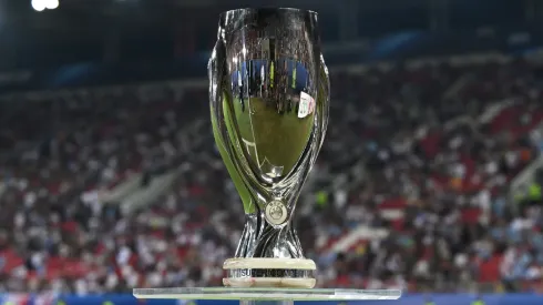 A detailed view of the UEFA Super Cup trophy is displayed on a plinth prior to the UEFA Super Cup 2023 match between Manchester City FC and Sevilla FC at Karaiskakis Stadium on August 16, 2023 in Piraeus, Greece.
