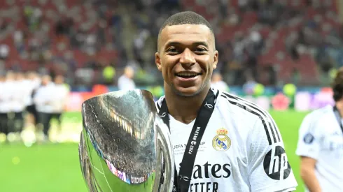 Kylian Mbappe of Real Madrid CF with Super Cup Trophy during the UEFA Super Cup between Real Madrid CF and Atalanta BC at Stadion Narodowy on August 14, 2024 in Warsaw, Poland.
