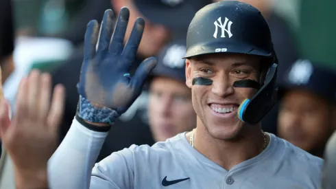 New York Yankees outfielder Aaron Judge (99) celebrates scoring at Kauffman Stadium Kansas<br />
City.