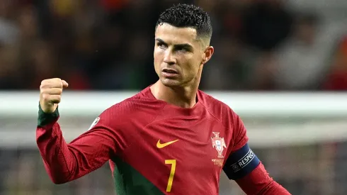 Cristiano Ronaldo of Portugal celebrates after scoring the team's second goal from the penalty spot during the UEFA EURO 2024 European qualifier match between Portugal and Slovakia.
