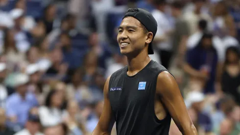 Li Tu during his first 2024 US Open match against Carlos Alcaraz
