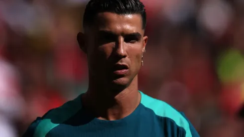 Cristiano Ronaldo of Portugal looks on as he warms up prior to the UEFA EURO 2024 group stage match between Turkiye and Portugal at Football Stadium Dortmund on June 22, 2024 in Dortmund, Germany.