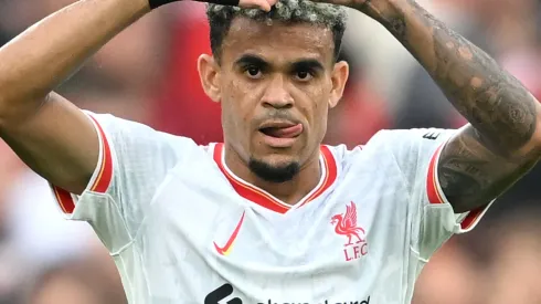 Luis Diaz of Liverpool celebrates scoring his team's first goal during the Premier League match between Manchester United FC and Liverpool FC at Old Trafford on September 01, 2024 in Manchester, England.