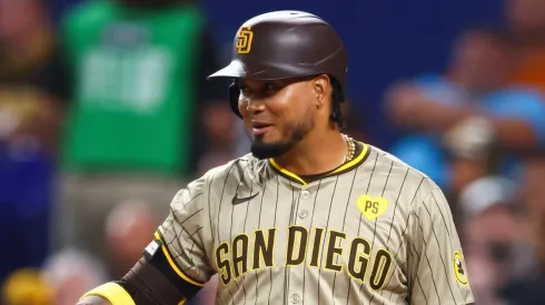 Luis Arraez #4 of the San Diego Padres reacts while at bat against the Miami Marlins during the first inning of the game at loanDepot park.
