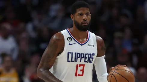 Paul George #13 of the Los Angeles Clippers brings the ball down the court against the Denver Nuggets