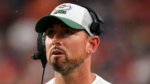 DENVER, COLORADO – AUGUST 18: Matt LaFleur of the Green Bay Packers coaches against the Denver Broncos during a preseason game at Empower Field At Mile High.
