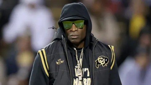 Head coach Deion Sanders of the Colorado Buffaloes walks on the field during pregame against the Stanford Cardinal at Folsom Field on October 13, 2023 in Boulder, Colorado. 
