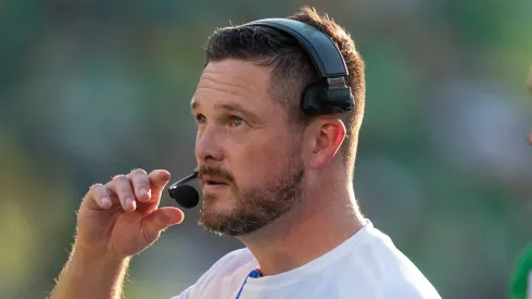 EUGENE, OREGON – AUGUST 31: Head Coach Dan Lanning of the Oregon Ducks looks up at the scoreboard during a timeout in the third quarter in the game against the Idaho Vandals at Autzen Stadium
