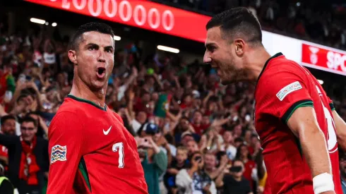 Cristiano Ronaldo (left) celebrates his goal for Portugal against Scotland.
