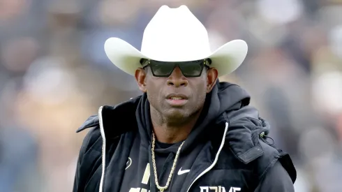  Head coach Deion Sanders of the Colorado Buffaloes watches as his team warms up prior to their spring game at Folsom Field on April 22, 2023 in Boulder, Colorado. 
