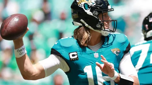 Trevor Lawrence #16 of the Jacksonville Jaguars attempts a pass during the first quarter against the Miami Dolphins at Hard Rock Stadium on September 08, 2024 in Miami Gardens, Florida.
