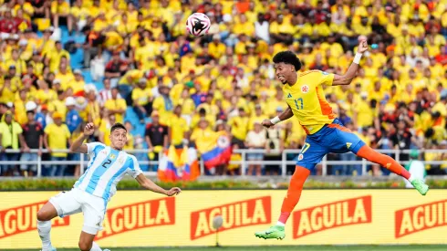 Johan Mojica of Colombia heads the ball against Nahuel Molina of Argentina during the South American FIFA World Cup 2026 Qualifier match
