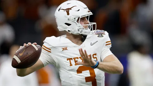 Quinn Ewers #3 of the Texas Longhorns warms up prior to playing against the Washington Huskies during the CFP Semifinal Allstate Sugar Bowl at Caesars Superdome on January 01, 2024 in New Orleans, Louisiana.