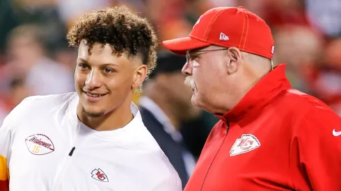 Patrick Mahomes #15 of the Kansas City Chiefs speaks to head coach Andy Reid of the Kansas City Chiefs prior to the game against the Green Bay Packers at Arrowhead Stadium on October 27, 2019 in Kansas City, Missouri.
