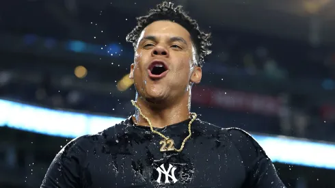 Juan Soto #22 of the New York Yankees reacts after a walk-off double against the Boston Red Sox during the tenth inning at Yankee Stadium on September 12, 2024 in the Bronx borough of New York City.