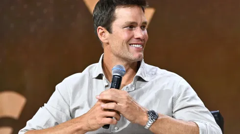 Tom Brady speaks at the Fanatics Fest NYC 2024 at Jacob Javits Center on August 16, 2024 in New York City.
