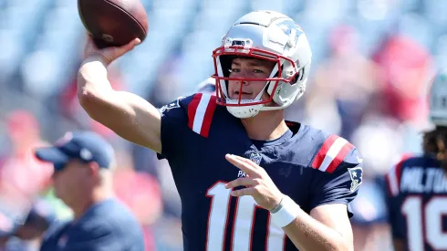 Drake Maye #10 of the New England Patriots warms up prior to the game at Gillette Stadium on September 15, 2024 in Foxborough, Massachusetts.
