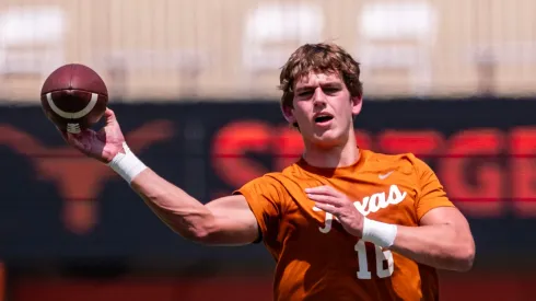 Arch Manning 16 of the Texas Longhorns warming up before their game vs the Rice Owls at DKR-Memorial Stadium
